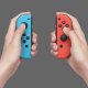 Nintendo Switch (modello Oled) Rosso neon/Blu neon, schermo 7 pollici 10